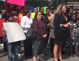 Free Renardo Lewis press conf