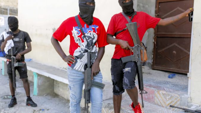 Soldiers of Jimmy Cherizier in lower Delmas in March 2024 Photo Odelyn Joseph AP 696x464