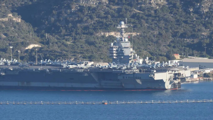 AA 20260224 40651435 40651419 US NAVY AIRCRAFT CARRIER SHIP DOCKS AT CRETE