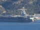 AA 20260224 40651435 40651419 US NAVY AIRCRAFT CARRIER SHIP DOCKS AT CRETE