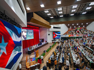 Photo shows packed auditorium in Havana for the International Colloquim in honor of Fidel’s 100th birthday
