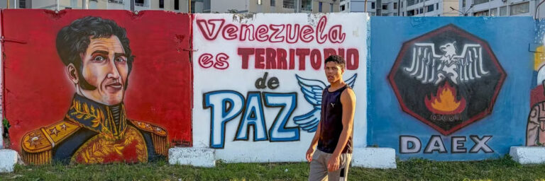 Mural reads venezuela is a peaceful territory in spanish